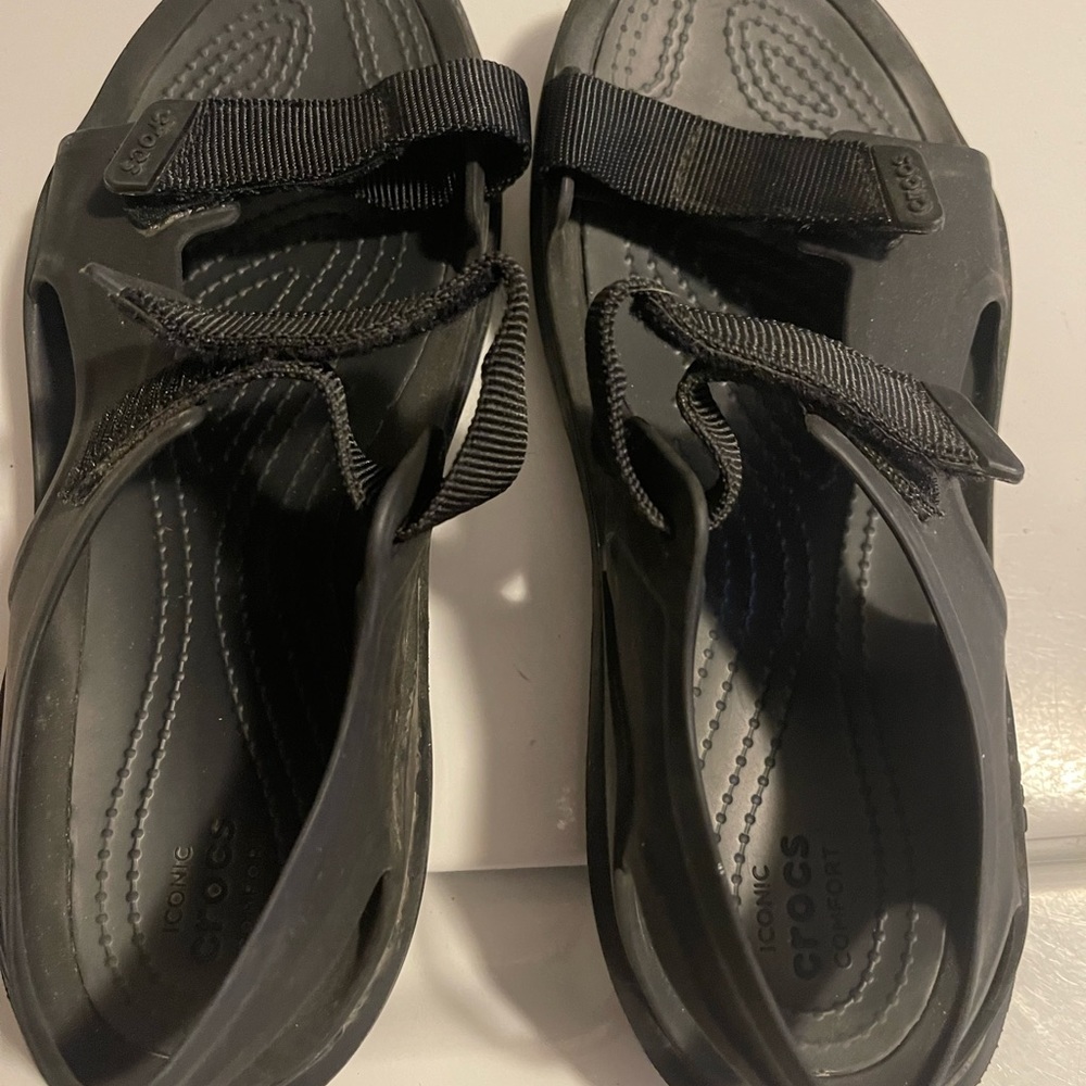 Crocs with Velcro straps.